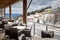 Terrace covered by snow at ski resort restaurant