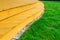 Terrace in formal garden after power washing - bright green lawn