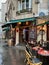 Terrace of the Great Canadian Pub in the rain, Quai des Grands Augustins, Paris, France