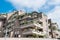 Terrace house with several balconies in the sunshine