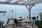 Terrace oyster restaurant seaside chairs and wood table on beach village of l`herbe in Cap Ferret France