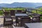 Terrace with tables and chairs with beautiful mountain views. Cafe terrace.