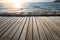 Terrace view sea with empty wooden table top on the beach landscape nature with sunset or sunrise - wooden board balcony view