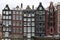 Terraced houses typical of the city of Amsterdam. Sloping facade