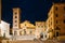 Terracina, Italy. Tower Of Cathedral Of San Cesareo In Night Time. It Built On Podium Of Temple Of Roma And Augustus