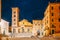 Terracina, Italy. Tower Of Cathedral Of San Cesareo In Night Time. It Built On Podium Of Temple Of Roma And Augustus