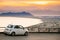 Terracina, Italy. White Color Fiat 500 Facelift 2016 Car Parked On Background Circeo Promontory And Tyrrhenian Sea In