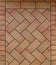 Terracotta floor with tiles arranged with different patterns