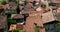 Terracotta rooftops of Italian village.