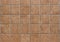 Terracotta rustic tiles with uneven edges, used both as wall cladding or flooring