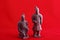 Terracotta warrior statues on a red background