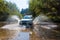 Terrain car on the mountain stream