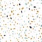Terrazzo texture or tile. Seamless pattern with blue, yellow and black mineral rock crumb scattered on white background