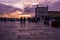 Terreiro do PaÃ§o, Lisbon - March 17, 2019 - People strolling in the square under a dazzling and colorful sunset, Portugal