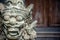 Terrible Asian buddhism demon face with copy space in vintage style