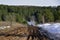 Terrible for cars, the dirt road of the old Siberian highway in the Romanov Log near the city of Kungur. Spring in the foothills o