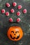 Terrible sweets brains for Halloween in decorative pumpkin on