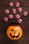 Terrible sweets brains for Halloween in decorative pumpkin on