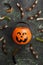 Terrible sweets worms for Halloween in decorative pumpkin on a