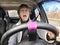 Terrified female driver a second before the accident. Scared middle-aged adult woman holds the steering wheel of a car