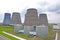 Territory of heat and power station. Accumulator tanks and cooling towers. Close-up