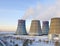 Territory of heat and power station. Accumulator tanks and cooling towers. Close-up. Winter