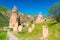 The territory of the Orthodox monastery Noravank in the summer morning at the red rock, a famous landmark