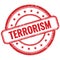 TERRORISM text on red grungy round rubber stamp