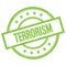 TERRORISM text written on green vintage stamp