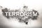 Terrorism word written in ash, dust, dirt as awful, dangerous, f