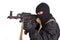 Terrorist in black uniform and mask with kalashnikov isolated