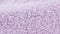 Terry lilac colored cloth towel texture as a background