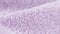 Terry lilac colored cloth towel texture as a background