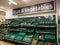 Tesco Bishopgate branch, showing low stocks of fruit and vegetables on shelves. Upturned green container baskets.