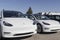 Tesla electric vehicles awaiting preparation. Tesla products include electric cars, battery energy storage and solar panels