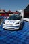 Tesla Executive racing electric car front view full lenght in cirrcuit paddock