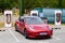 Tesla model 3 charging in super charged station car electric vehicle us brand