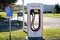 Tesla Supercharger car parked station reserved for electric Tesla ev cars to be fast