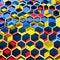 A tessellation of hexagons in bright, contrasting colors like red, yellow, and blue3, Generative AI