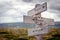 test trace track text engraved on old wooden signpost outdoors in nature