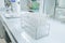 Test tube in rack on laboratory shelf, with laboratory background, medical equipment
