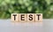 Test word written on wooden blocks. Business concept. Test sign  exam  learning concept. Education quality control. Medical