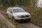 Testing a 4x4 jeep car at the edge of a forest