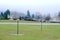 Tetherball Posts in School Yard beside the Street