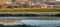 Tetouan city in the north of Morocco with a group of storks in the river