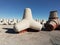Tetrapods in Japan against a blue sky