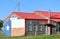 Texas BBQ - Lone Star Flag on side of Old Building