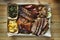 Texas bbq style tray with smoked beef brisket, st louis ribs, chicken and hot links