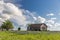 Texas bluebonnet field and abandon barn in Ennis, Texas