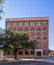 The Texas School Book Depository, now known as the Dallas County Administration Building, the place from which Lee Harvey Oswald